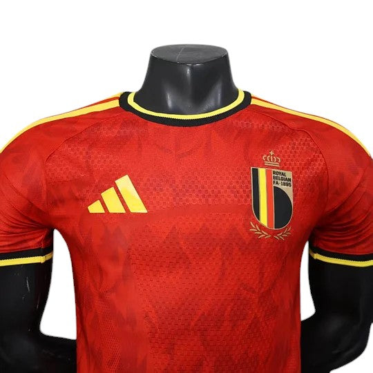 GOATkitz Belgium 2026 Player Version Home Jersey in red with yellow accents. Features crest and Adidas logo.
