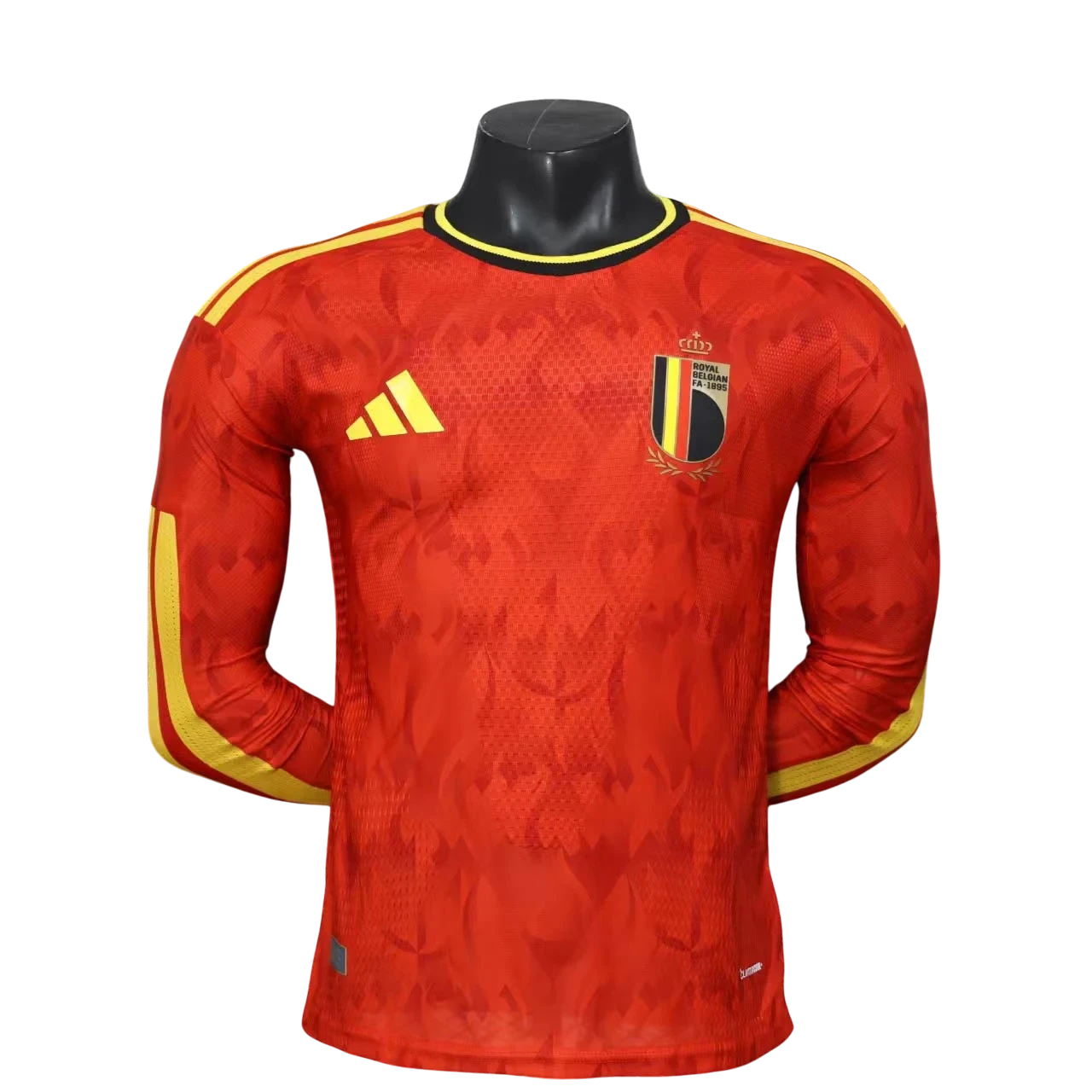 GOATkitz Belgium 2026 long sleeve player version home jersey in red with yellow accents and crest. Customizable.