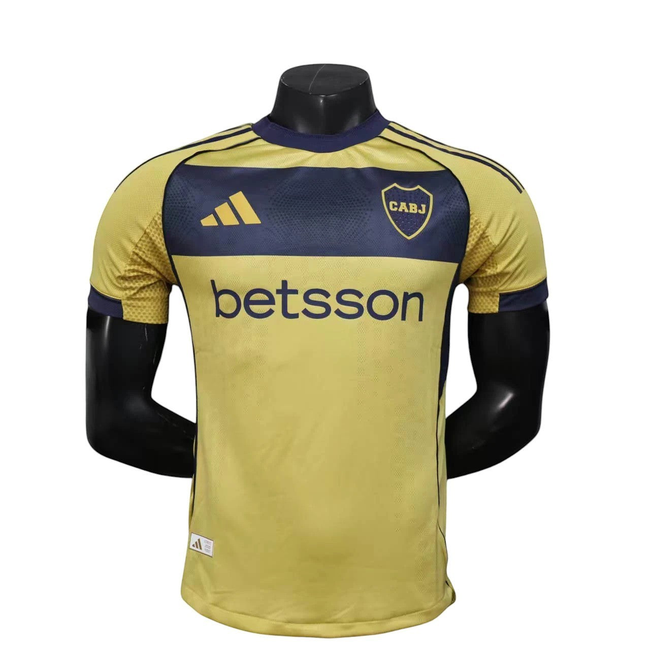 GOATkitz Boca Juniors 2025-26 Player Version Away Jersey in yellow and navy blue, customizable with name and number.