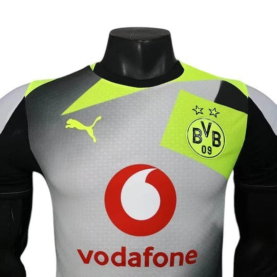 Borussia Dortmund 2025-26 player version away jersey in grey with neon yellow accents and Vodafone logo. Customizable.