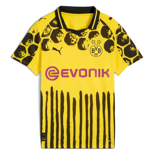 GOATkitz Borussia Dortmund 2025-26 KidSuper yellow jersey with black abstract print and vertical stripes. Features Evonik logo.