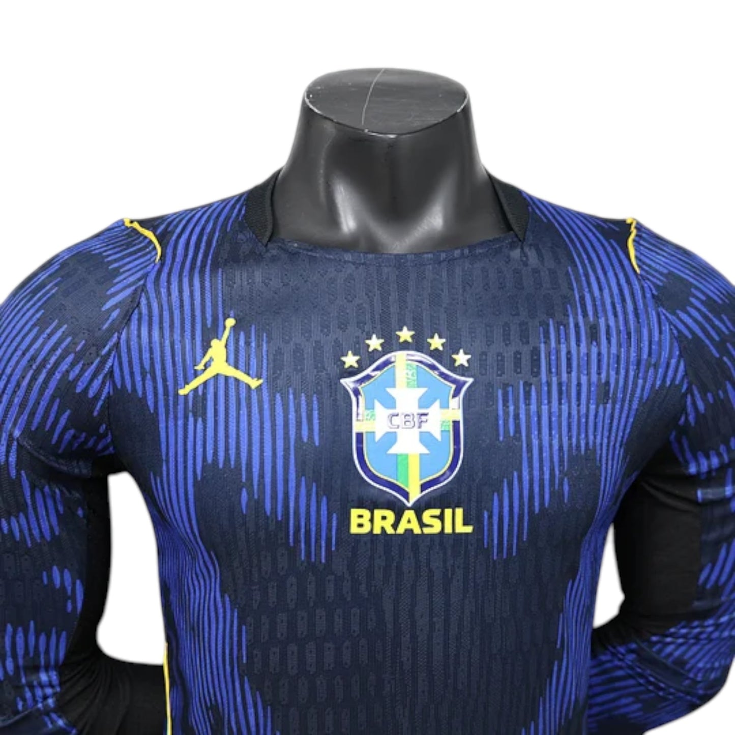 GOATkitz Brazil 2026 long sleeve player version away jersey in navy blue with yellow accents and crest.