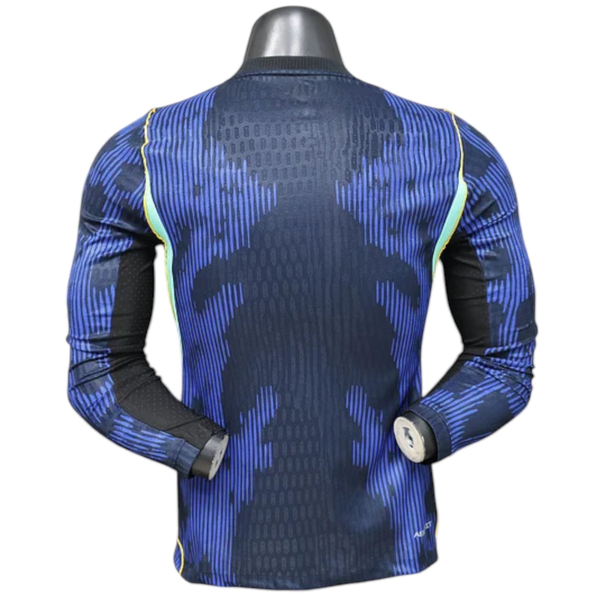 GOATkitz Brazil 2026 long sleeve player version away jersey in navy blue with blue vertical stripe pattern and black panels.