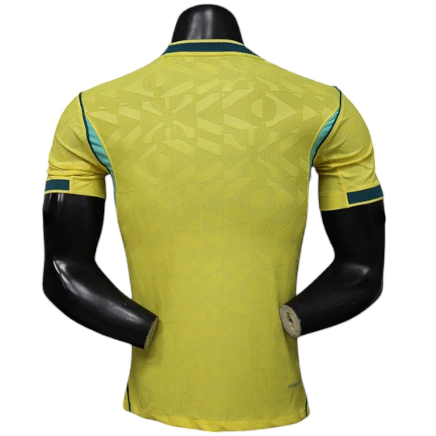 GOATkitz Brazil 2026 Player Version Home Jersey, yellow with green trim and subtle geometric pattern. Customizable.