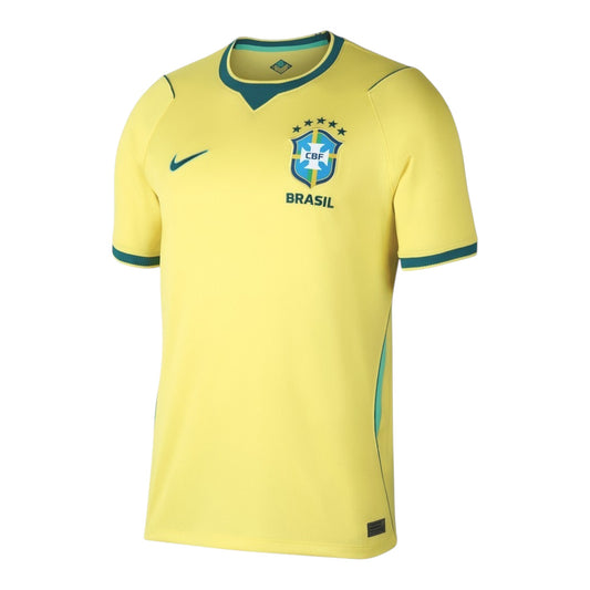 GOATkitz Brazil 2026 kids home soccer jersey in yellow with green trim. Features CBF crest and Nike swoosh.