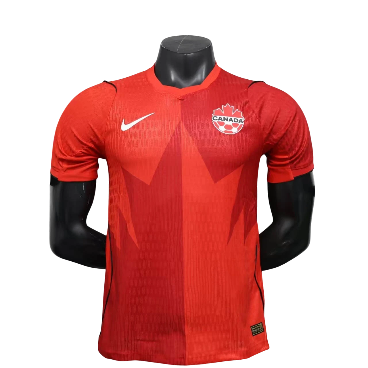 GOATkitz Canada 2026 player version red soccer jersey with maple leaf design and Nike logo.