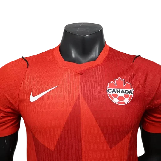 GOATkitz Canada 2026 player version red soccer jersey with white Nike swoosh and Canada crest. Customizable.