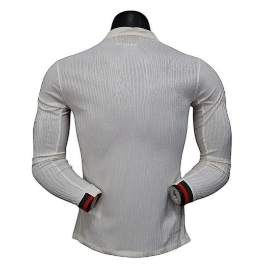 GOATkitz Chelsea 2025-26 away long sleeve player version jersey in white with subtle vertical stripe pattern and red/black cuffs.