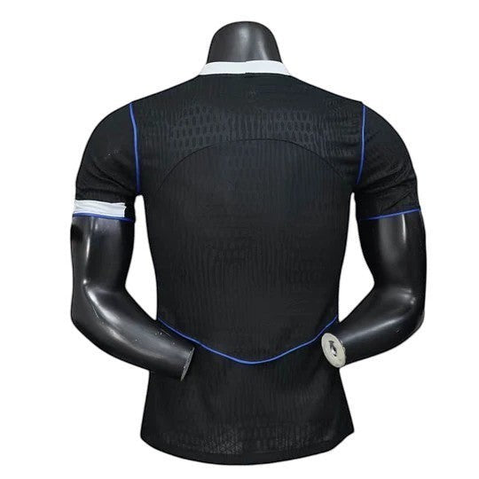 GOATkitz Chelsea 2025-26 black player version third jersey with blue trim and white sleeve bands.