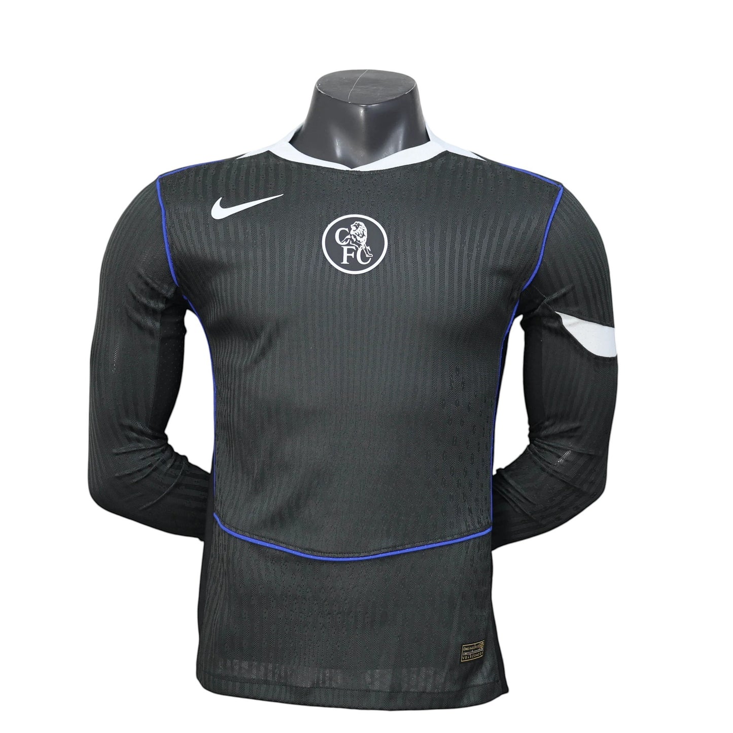 GOATkitz Chelsea 2025-26 adult player version third long sleeve jersey in black with white collar and blue trim.