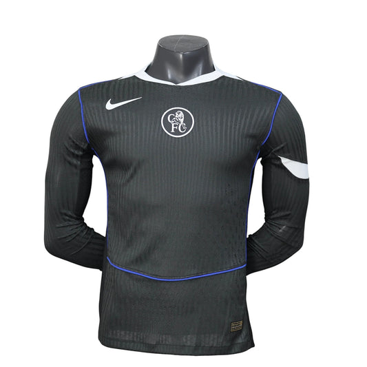 GOATkitz Chelsea 2025-26 adult player version third long sleeve jersey in black with white collar and blue trim.