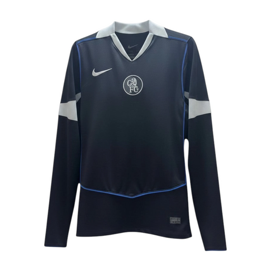 GOATkitz Chelsea 2025-26 adult third long sleeve jersey in navy blue with white collar and blue trim. Features Nike logo and Chelsea FC crest.