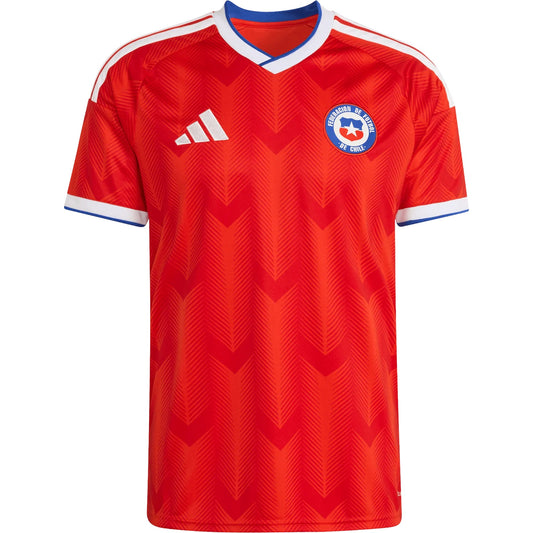 GOATkitz Chile 2026 Adult Home Jersey, red with white Adidas stripes and blue collar. Features chevron pattern and team crest.
