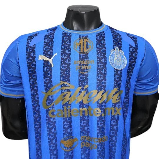 GOATkitz Chivas 2025-26 Player Version Away Jersey in blue with gold accents and pinstripe pattern. Customizable.