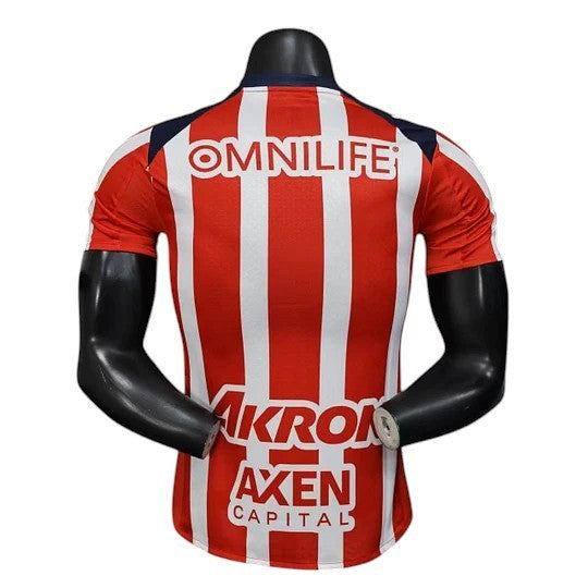 GOATkitz Chivas 2025-26 player version home jersey, red and white vertical stripes, navy collar and shoulders, customizable.