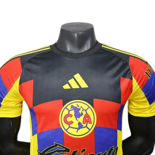 GOATkitz Club América 2025-26 player version home jersey in black, red, yellow, and blue checkered pattern with yellow Adidas logo.