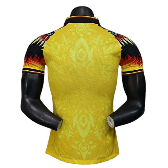 GOATkitz Club América 2025-26 Player Version yellow special edition jersey with black and red flame details on sleeves.