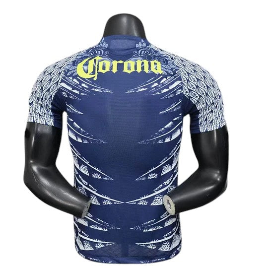 GOATkitz Club América 2025-26 Player Version Away Jersey, navy blue with white feather pattern and yellow "Corona" logo.