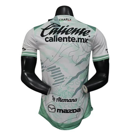 GOATkitz Club León 2025-26 player version away jersey in white with green accents and abstract pattern. Customizable.
