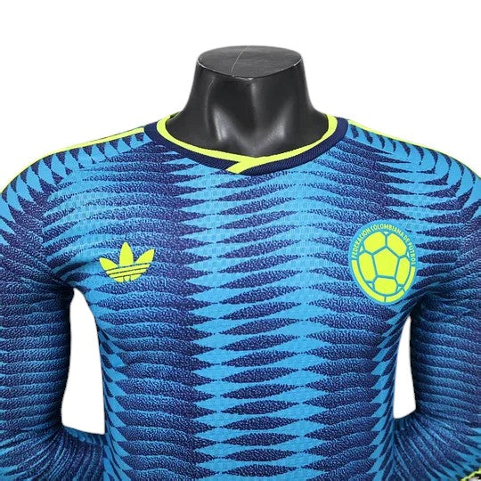 GOATkitz Colombia 2026 long sleeve player version away jersey in blue with yellow accents and crest. Features Adidas logo.