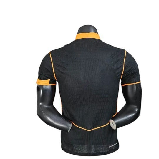GOATkitz black 2025-26 Corinthians player version third jersey with orange trim and subtle textured pattern.