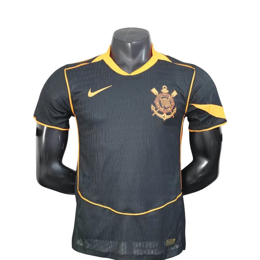 GOATkitz Corinthians 2025-26 player version third jersey, black with orange trim and accents. Customizable.