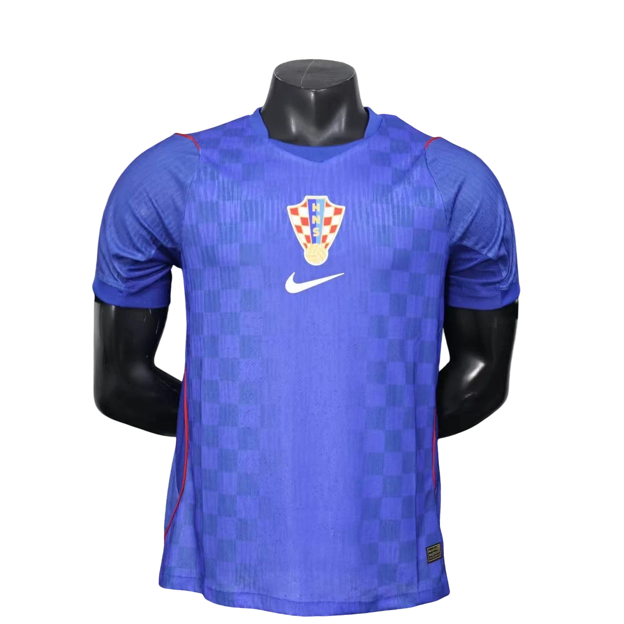 GOATkitz Croatia 2026 player version away jersey in blue with checkered pattern, Nike logo, and Croatia crest.