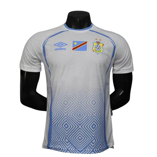 GOATkitz DR Congo 2026 player version away jersey in white with blue accents and geometric pattern. Features Umbro logo and team crest.