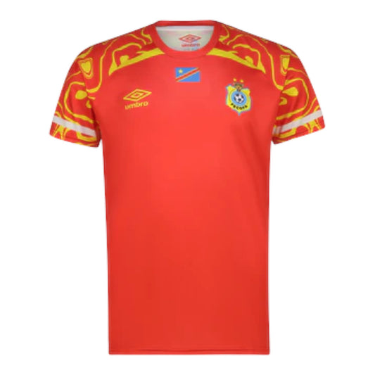 GOATkitz DR Congo 2026 Third Jersey in red with yellow abstract pattern on shoulders and sleeves. Features team crest and Umbro logo.