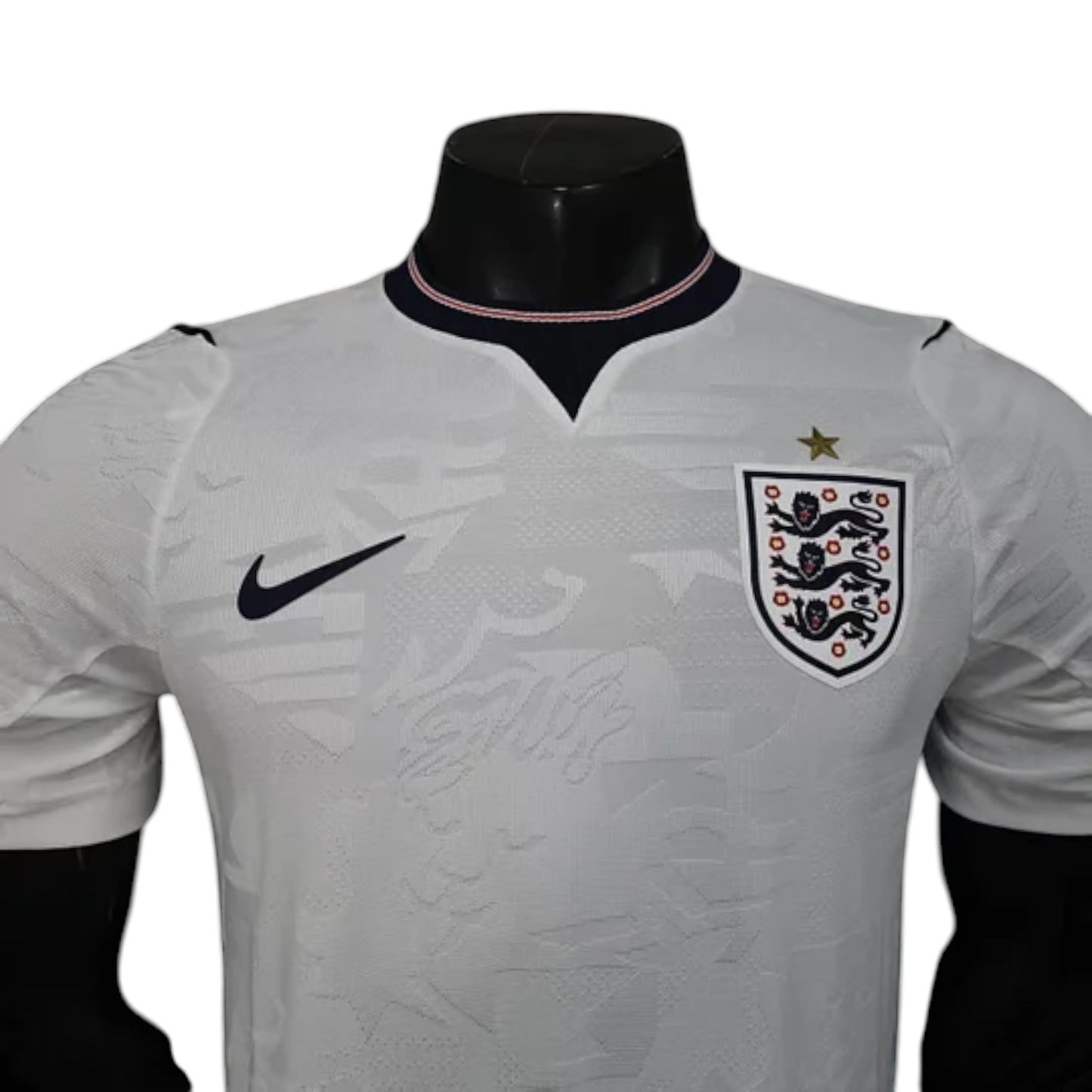 GOATkitz England 2026 player version white football jersey with navy blue Nike logo and crest. Features customisable name/number and optional badges.