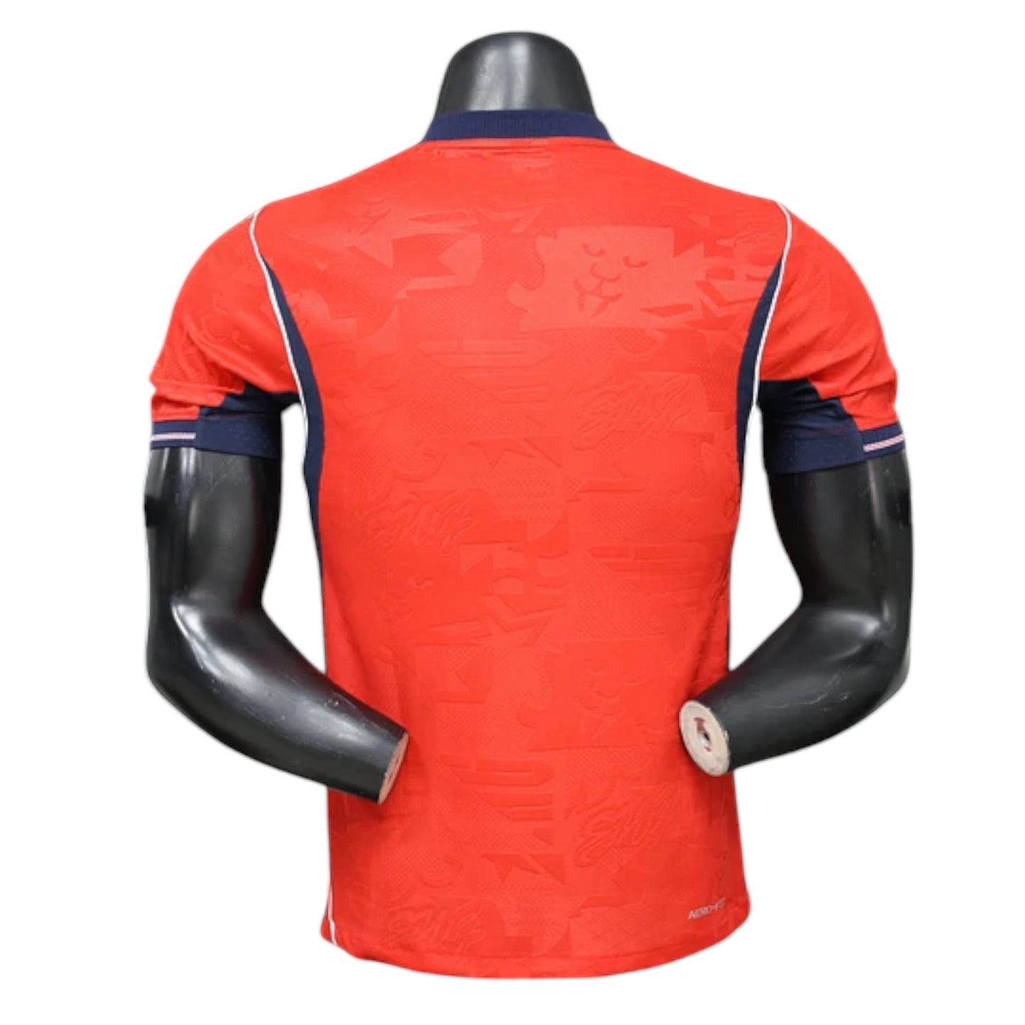 GOATkitz England 2026 Player Version Away Jersey, red with navy blue accents and subtle embossed pattern. Back view.