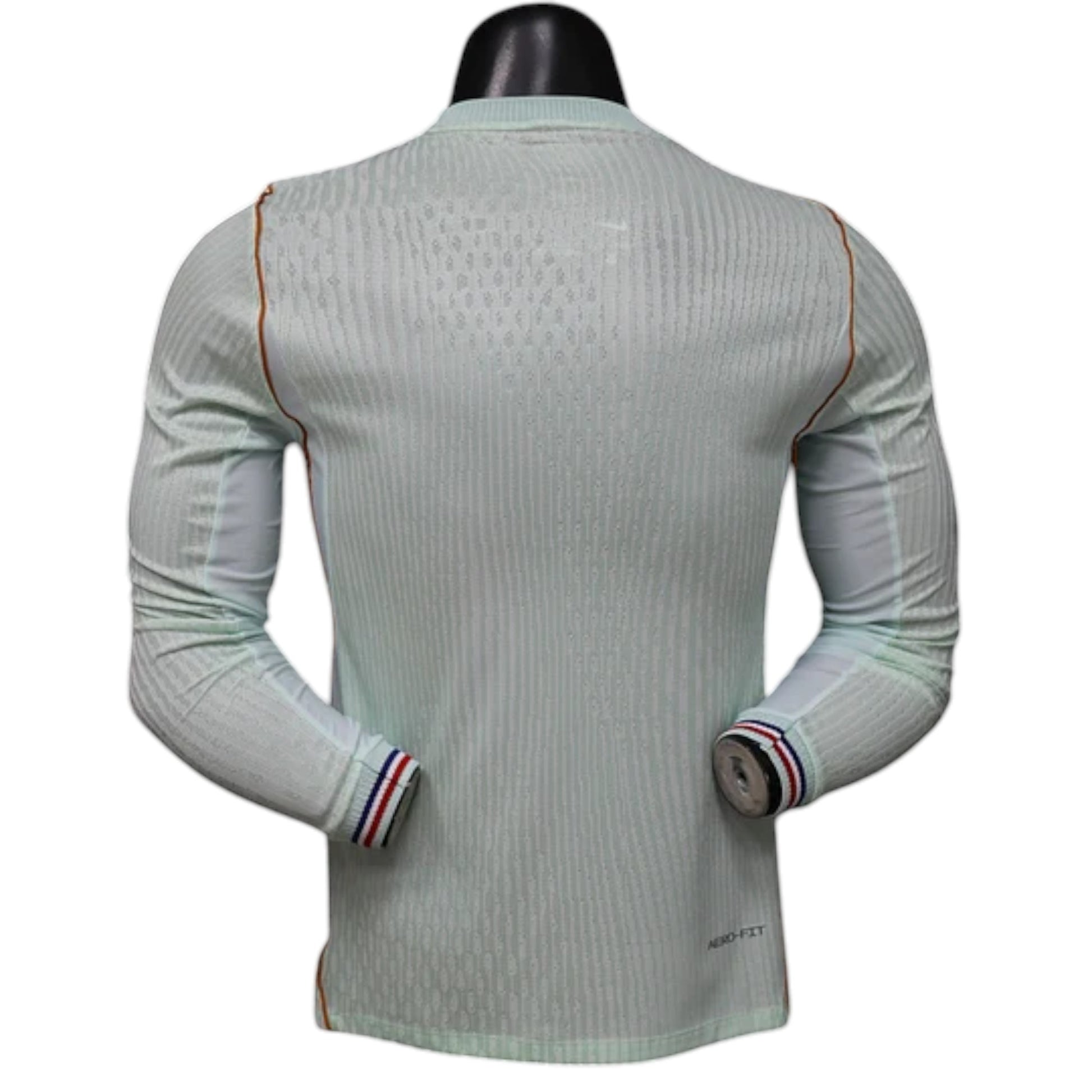GOATkitz France 2026 long sleeve player version away jersey in light blue with subtle vertical stripes and red/blue trim on cuffs.