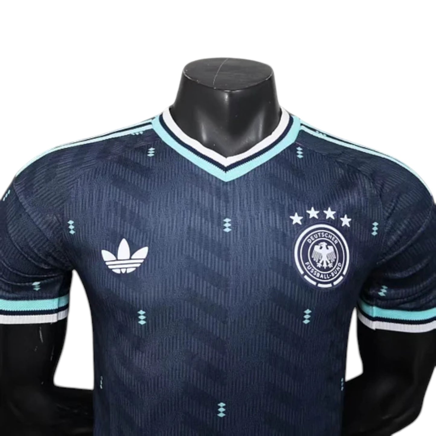GOATkitz Germany 2026 player version away soccer jersey. Dark navy with light blue and white trim. Features Adidas logo and German crest.