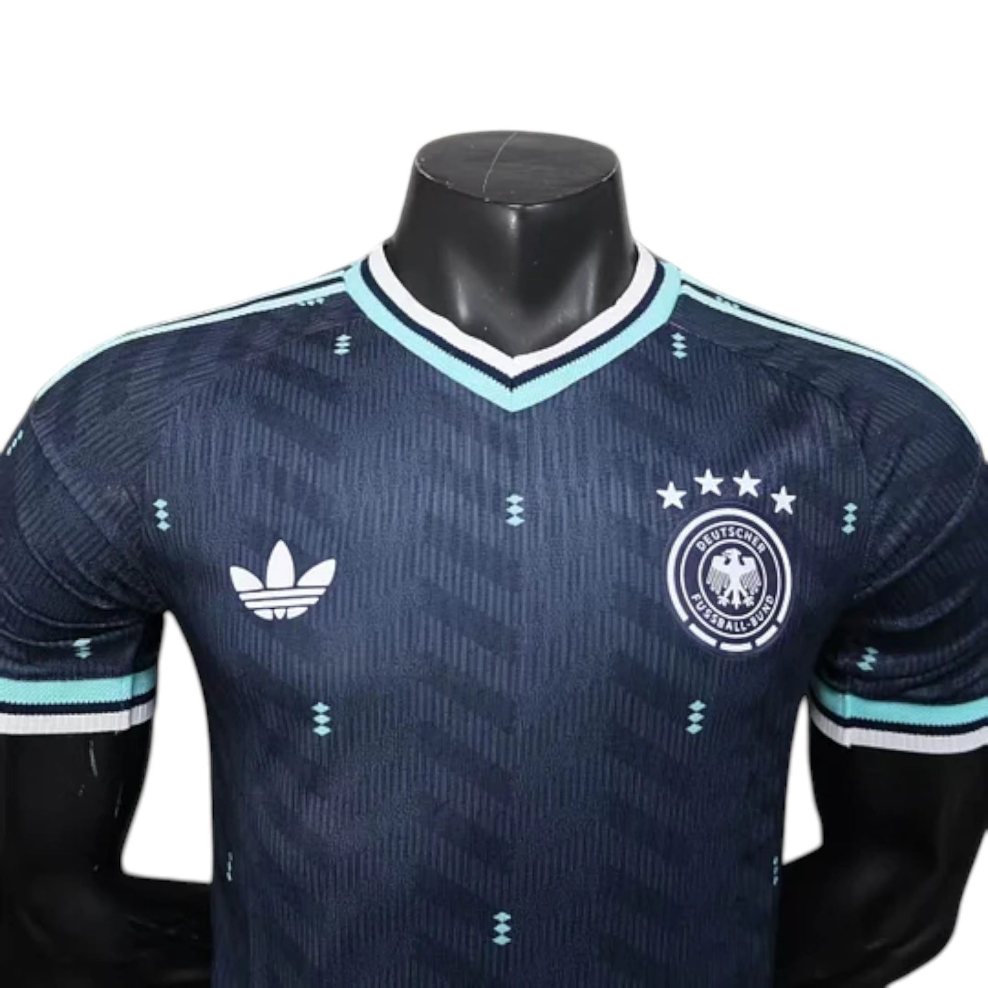 GOATkitz Germany 2026 player version away soccer jersey. Dark navy with light blue and white trim. Features Adidas logo and German crest.