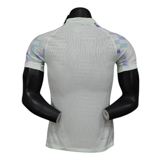 GOATkitz Inter Milan 2025-26 away player version jersey, light green with checkered sleeve accents. Customizable.
