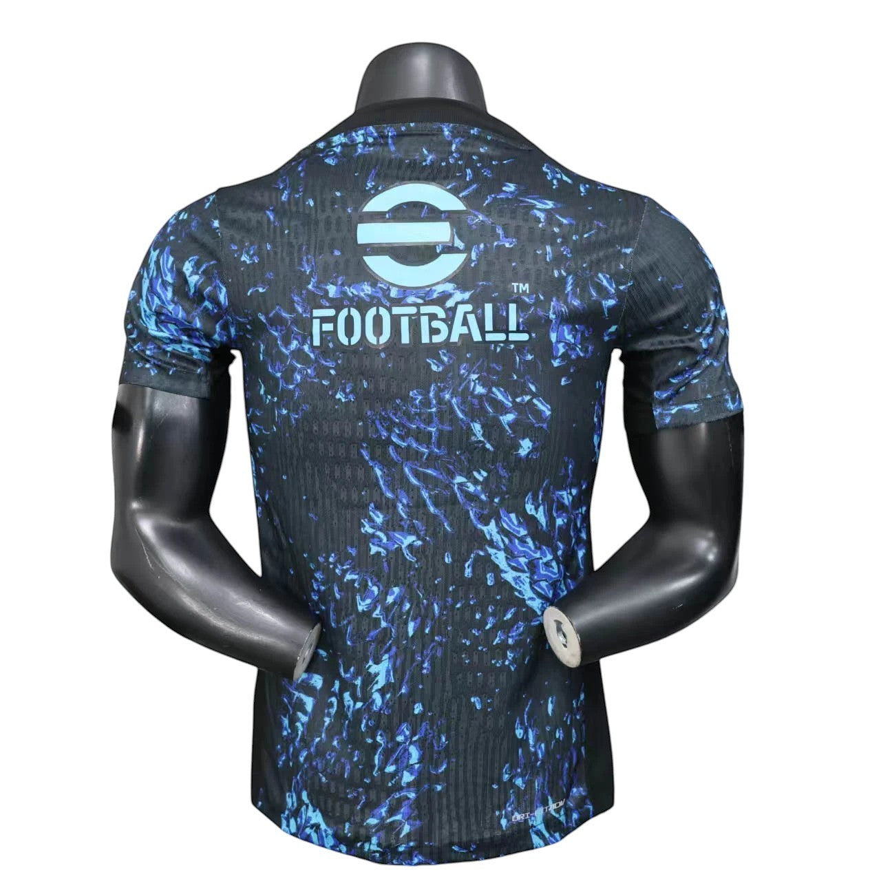 GOATkitz Inter Milan 2025-26 player version pre-match jersey, black with blue flame pattern and "FOOTBALL" logo.