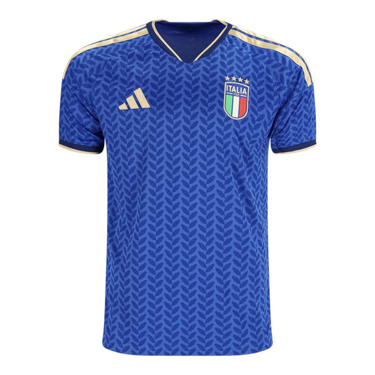 GOATkitz Italy 2026 Adult Home Jersey in royal blue with a repeating leaf pattern and gold accents. Features the Italy crest and Adidas logo.
