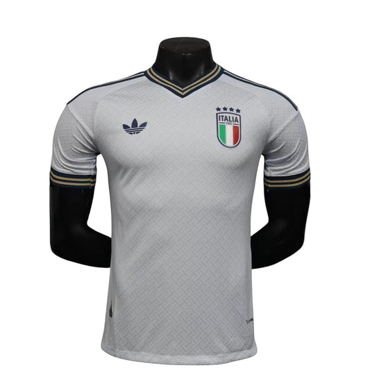 GOATkitz Italy 2026 player version away jersey in white with navy and gold trim. Features the Italia crest and Adidas logo.