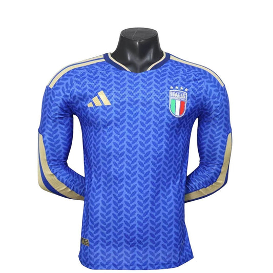 GOATkitz Italy 2026 long sleeve player version home jersey in blue with gold accents and a repeating leaf pattern. Features the Italia crest.