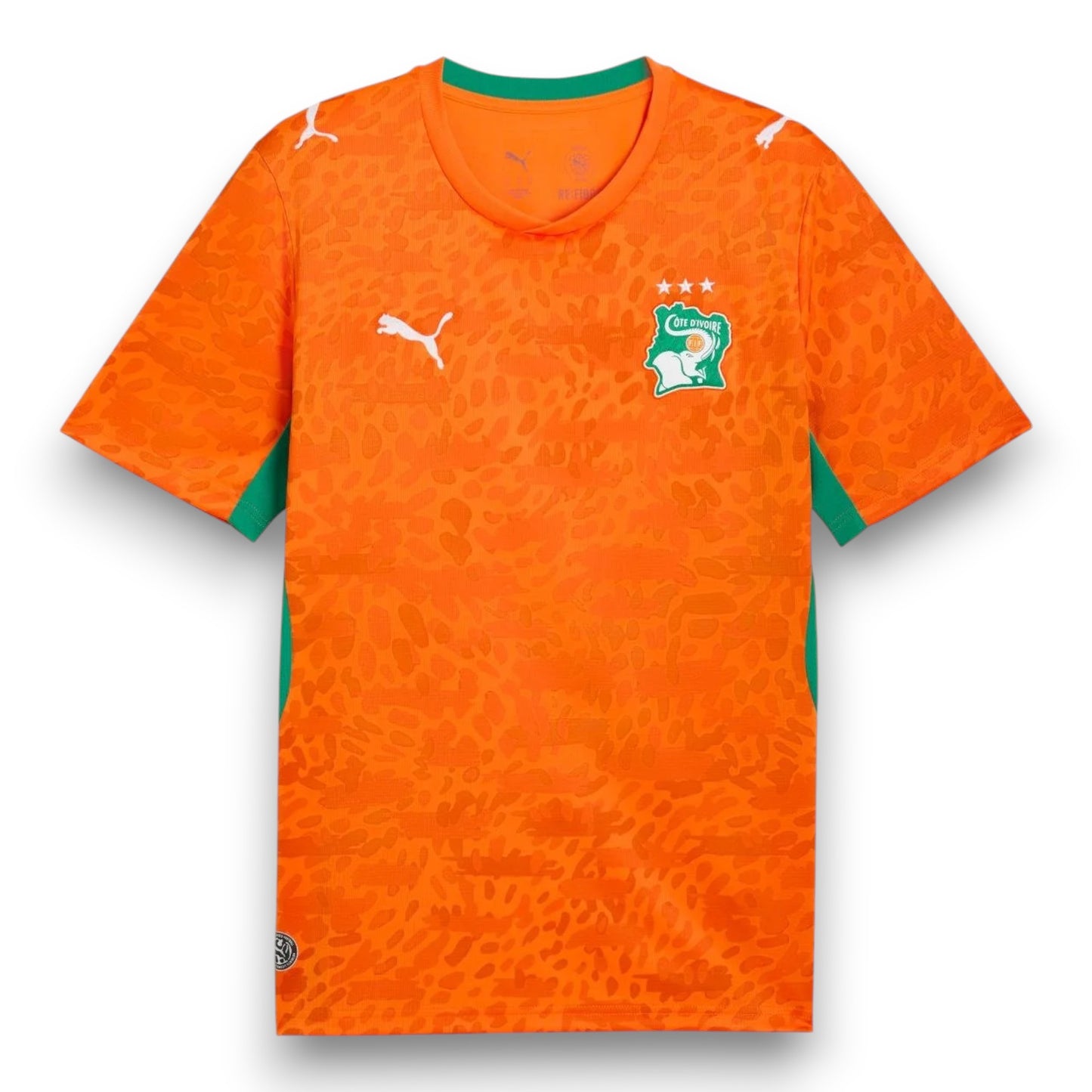 GOATkitz Ivory Coast 2026 adult home jersey in orange with green trim and textured pattern. Features team crest and Puma logo.