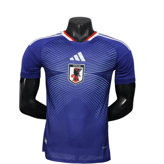 GOATkitz Japan 2026 player version home jersey in blue with white pinstripe pattern and red trim on collar.