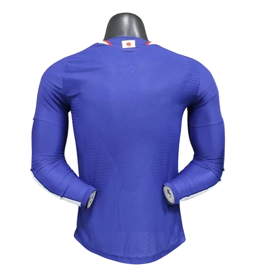GOATkitz Japan 2026 long sleeve player version home jersey in royal blue with white accents on the sleeves and collar. Features a subtle textured pattern.