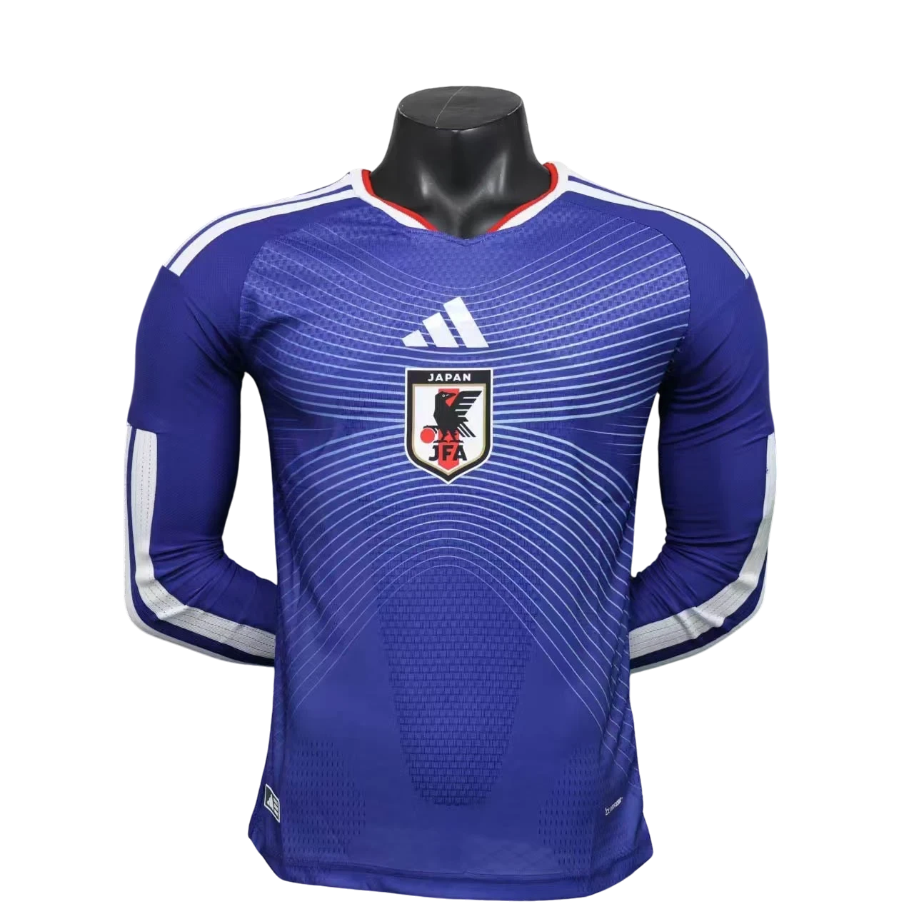 GOATkitz Japan 2026 long sleeve player version home jersey in blue with white accents and crest. Customizable.
