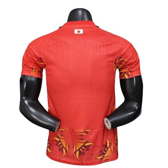 GOATkitz Japan 2026 red goalkeeper player version jersey with flame accents on sleeves and hem. Features a small Japanese flag detail on the collar.