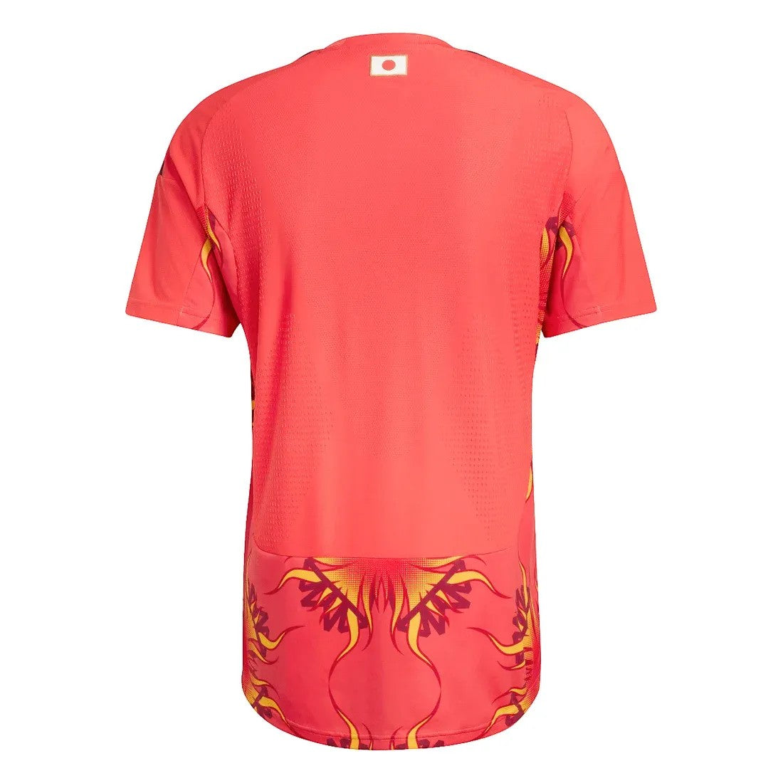 GOATkitz Japan 2026 red goalkeeper jersey with flame-like yellow and orange graphic detail on the hem. Features a small Japanese flag emblem on the upper back.