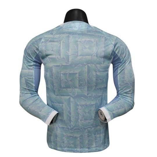 GOATkitz Juventus 2025-26 away long sleeve player version jersey in light blue with abstract pattern. Customizable.