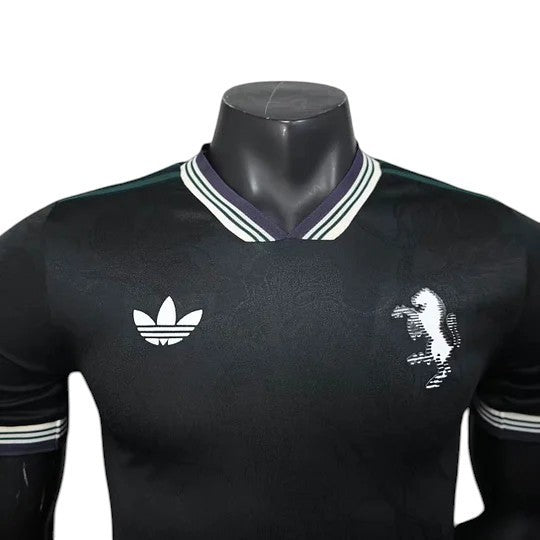 GOATkitz Juventus 2025-26 black player version third jersey with white Adidas logo and crest. V-neck with striped trim.