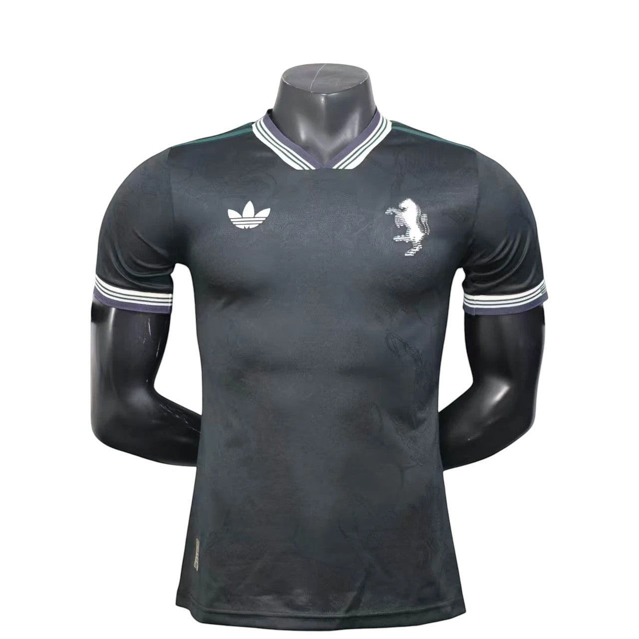 GOATkitz Juventus 2025-26 adult player version third jersey in dark grey with white Adidas logo and crest. Features striped cuffs and collar.