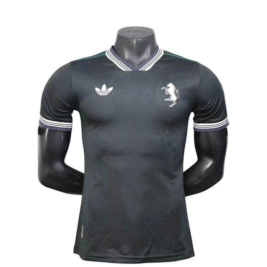 GOATkitz Juventus 2025-26 adult player version third jersey in dark grey with white Adidas logo and crest. Features striped cuffs and collar.