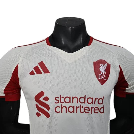 GOATkitz Liverpool 2025-26 adult player version away jersey in white with red accents. Features crest, sponsor logo, and Adidas branding.